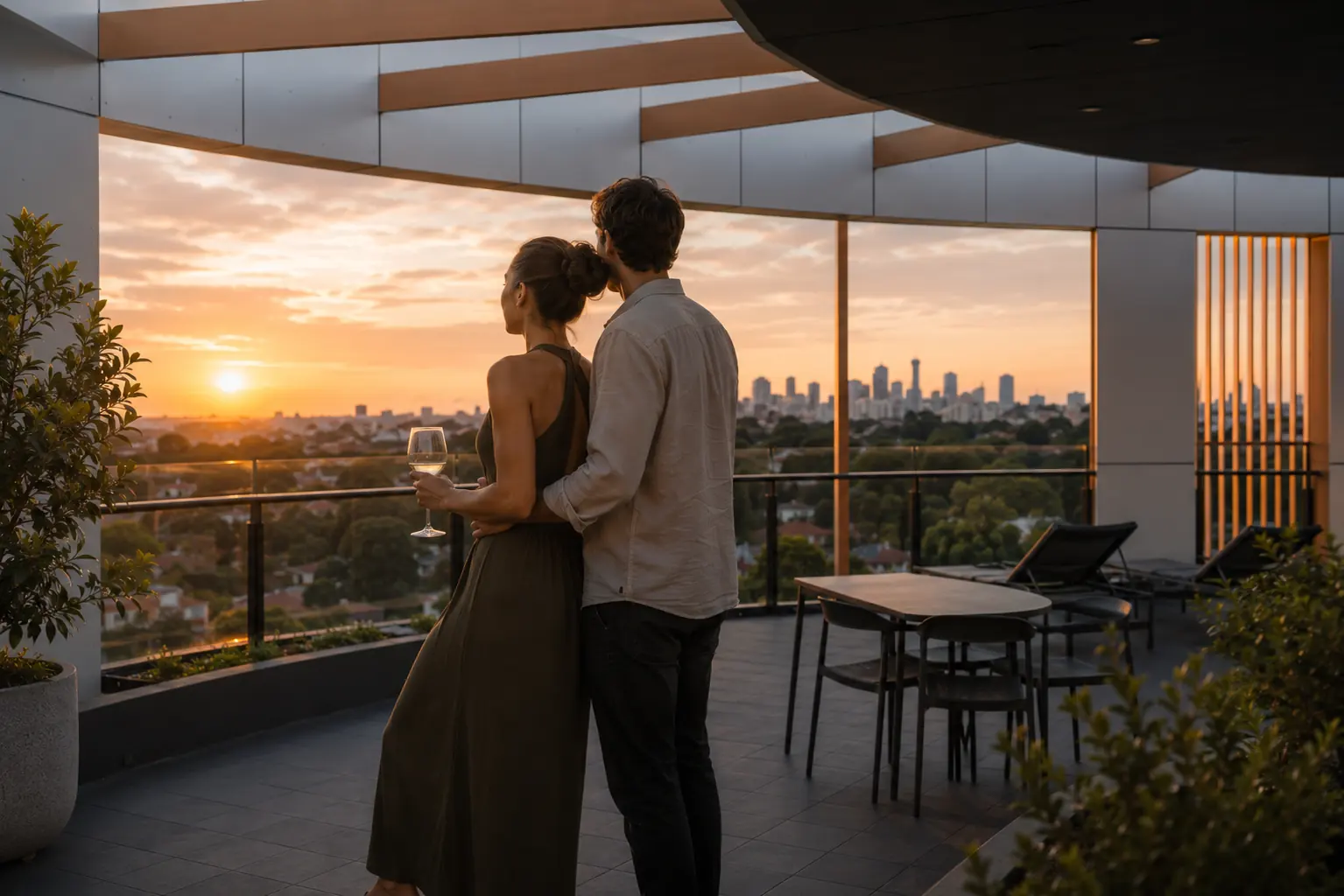 Residents enjoying the rooftop terrace with skyline views
